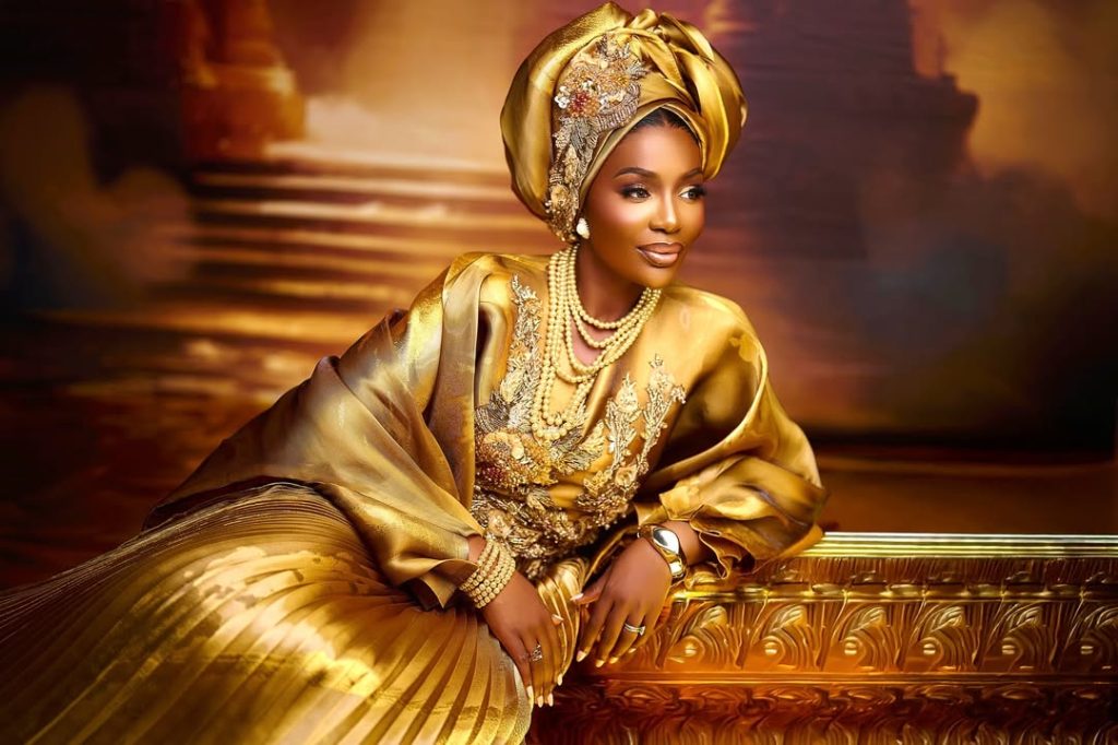 Queen Ivie Atuwatse Embodies Timeless Elegance in Gilded Glamour
