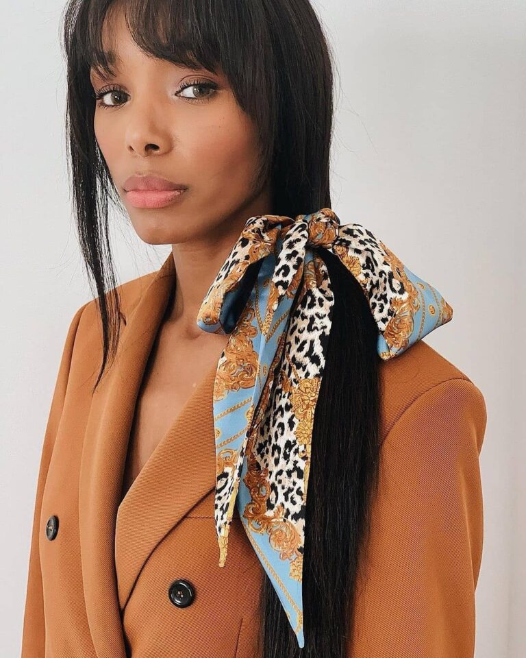 How Do You Wear Your Scarf? This Tik Tok Star Can Turn a Scarf Into