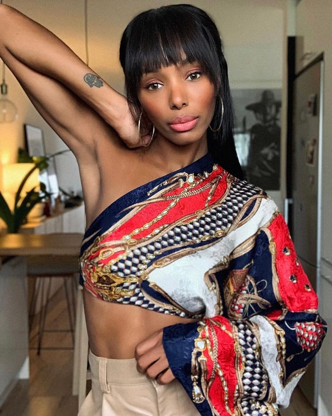 How Do You Wear Your Scarf? This Tik Tok Star Can Turn a Scarf Into