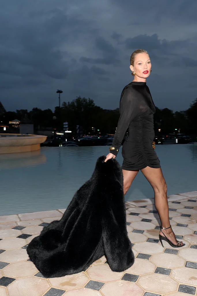 Wearing a coat is "so last season," according to Kate Moss