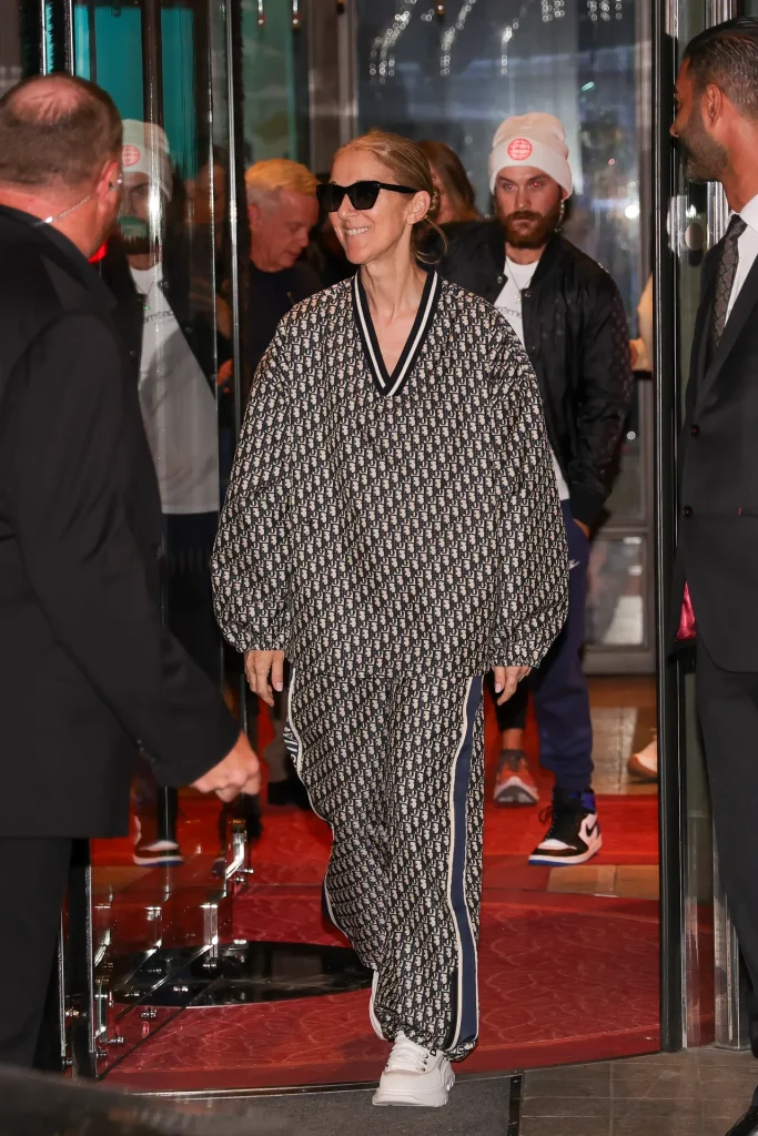 Céline Dion wearing Dior trascksuit