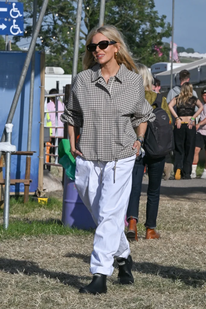 Sienna Miller is seen on day one of the Glastonbury Festival wearing Iconic British heritage brand Barbour on June 28, 2024 in Glastonbury, England