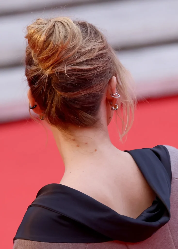 The back of Jennifew Lawrence's updo on a red carpet
