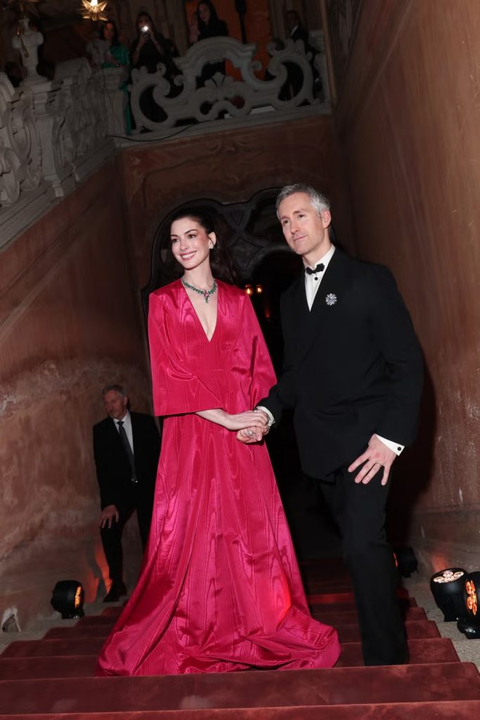 Image may contain Clothing Dress Black Hair Hair Person Formal Wear Head Adult Face Evening Dress and Photography